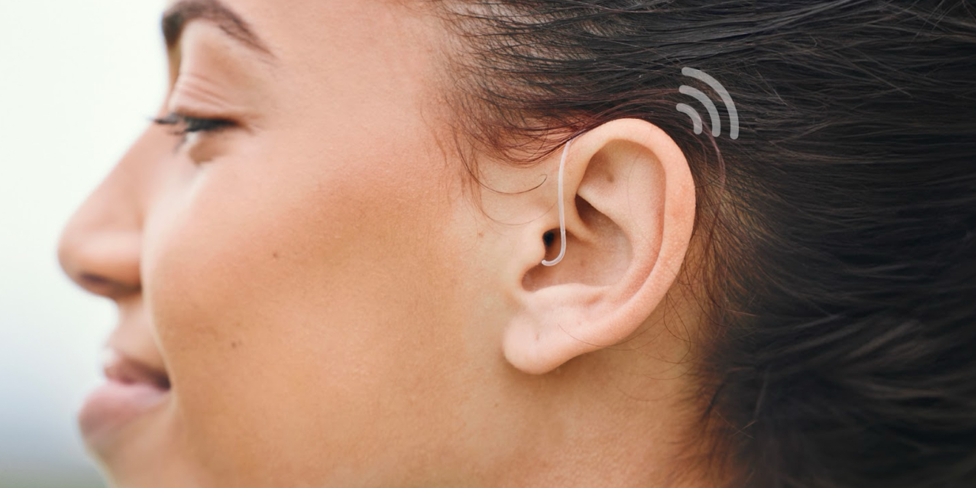 Person touching their ear